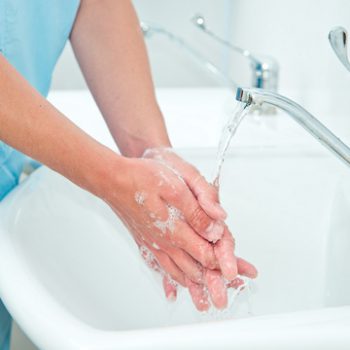 person washing their hands